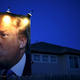 A picture of Trump hangs outside a house in West Des Moines, Iowa.
